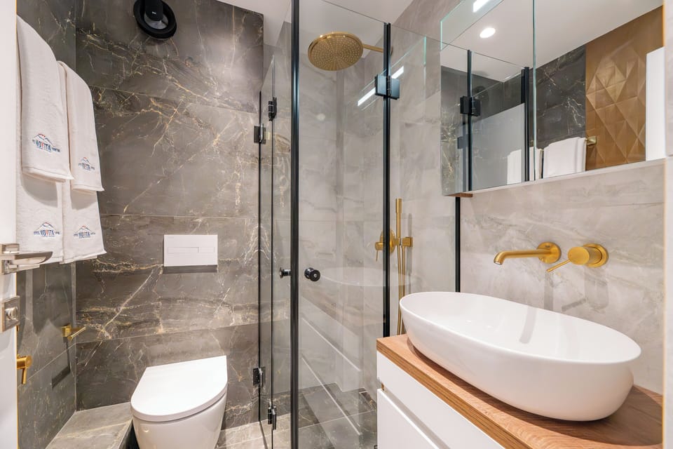 Superior Double Room, City View | Bathroom | Shower, free toiletries, hair dryer, slippers
