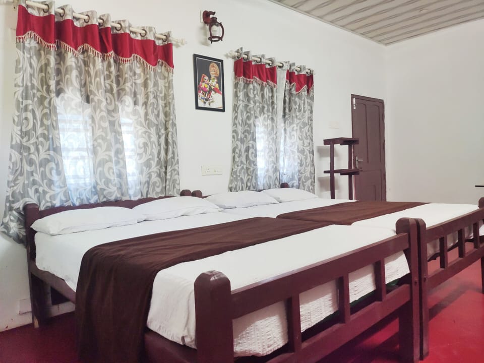 Traditional Twin Room, 2 Double Beds, Smoking | 3 bedrooms, in-room safe, desk, laptop workspace