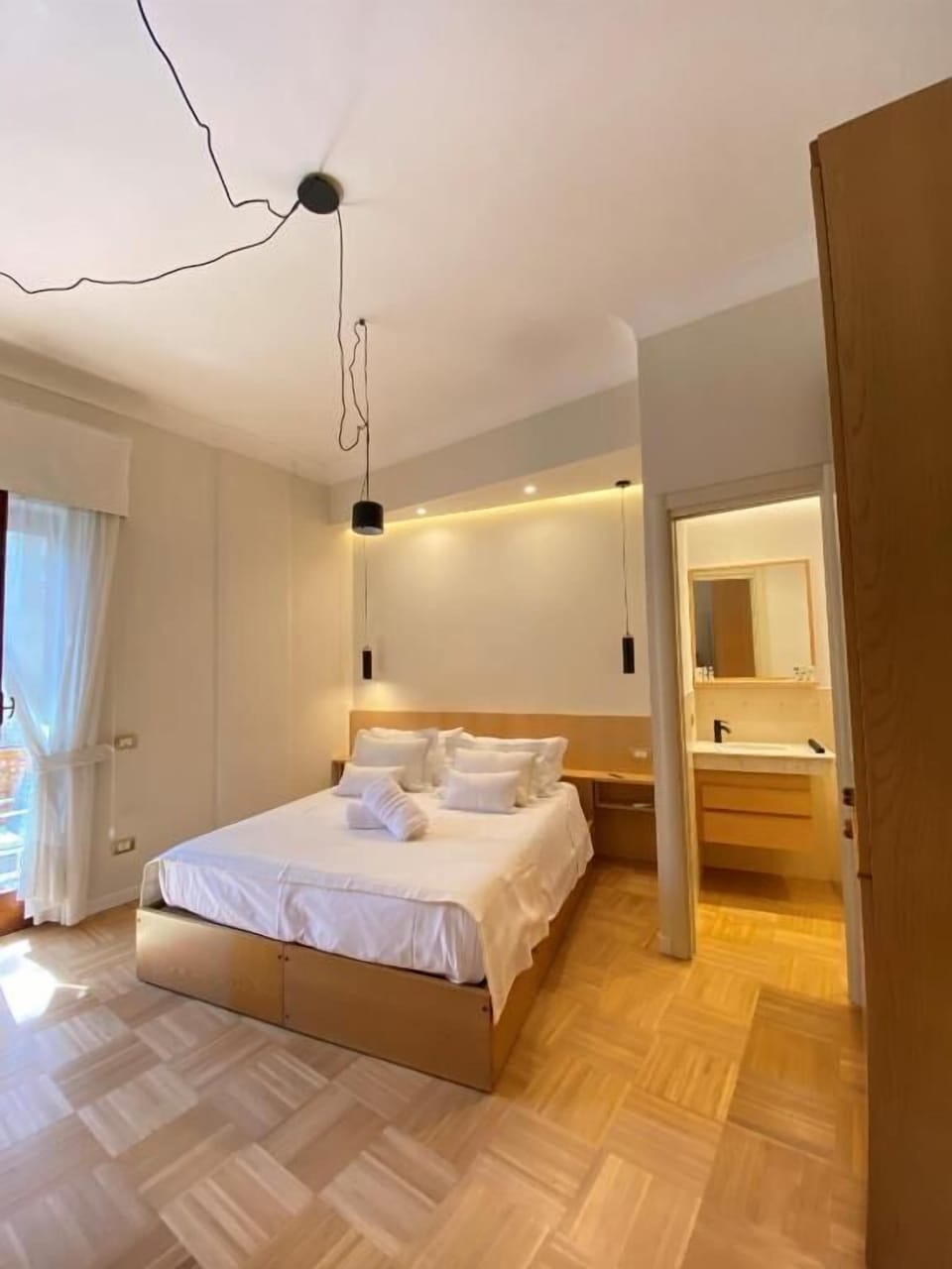 Double Room, Balcony, City View | In-room safe, blackout drapes, iron/ironing board, free WiFi