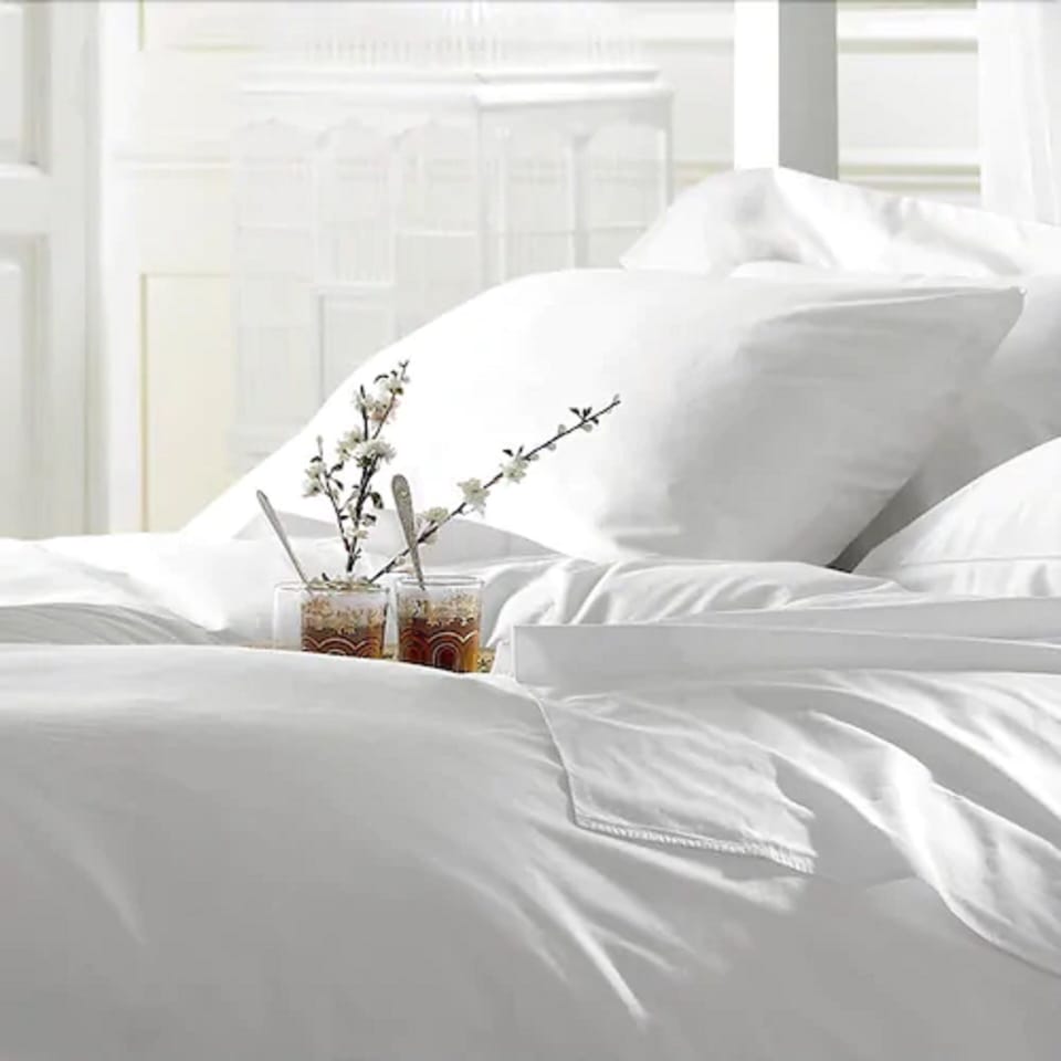 Suite, 2 Bedrooms | Down comforters, individually decorated, blackout drapes