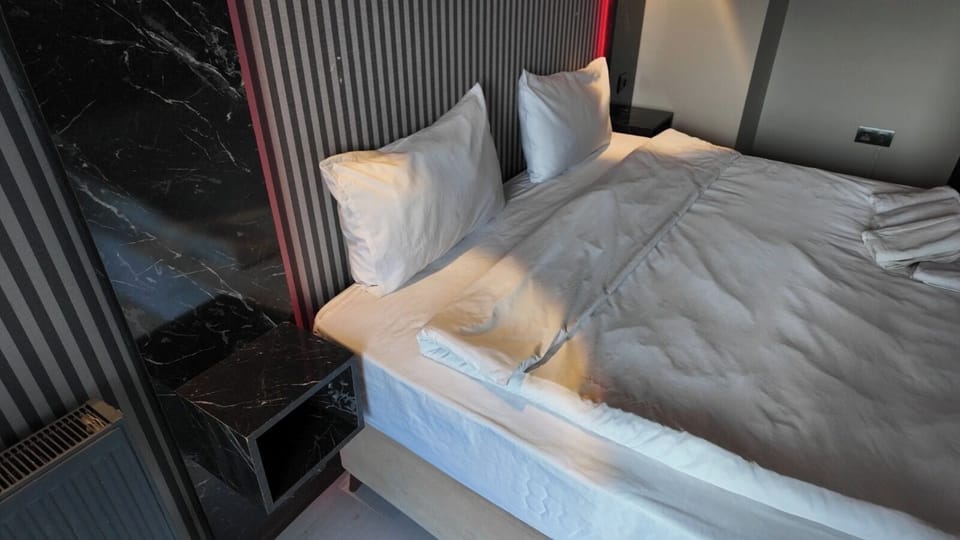 Double Room, Balcony, City View | Desk, laptop workspace, blackout drapes, soundproofing