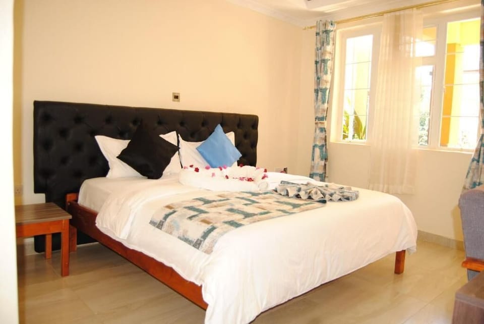 Deluxe Double Room, Garden View | Free WiFi, bed sheets