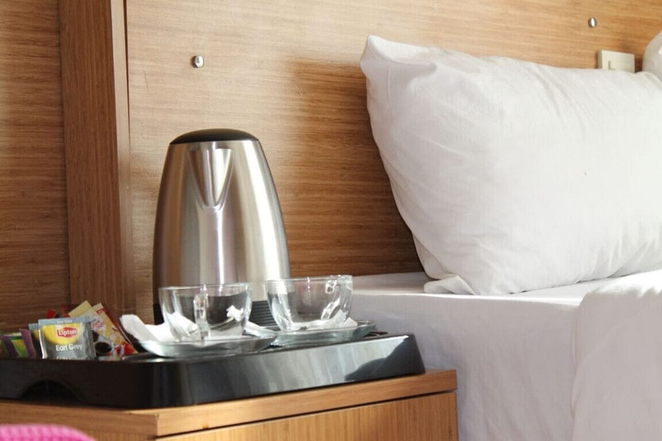 Deluxe Single Room, City View | Desk, laptop workspace, free WiFi