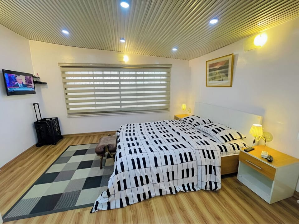 Economy Room, Balcony, City View | Desk, laptop workspace, blackout drapes, soundproofing