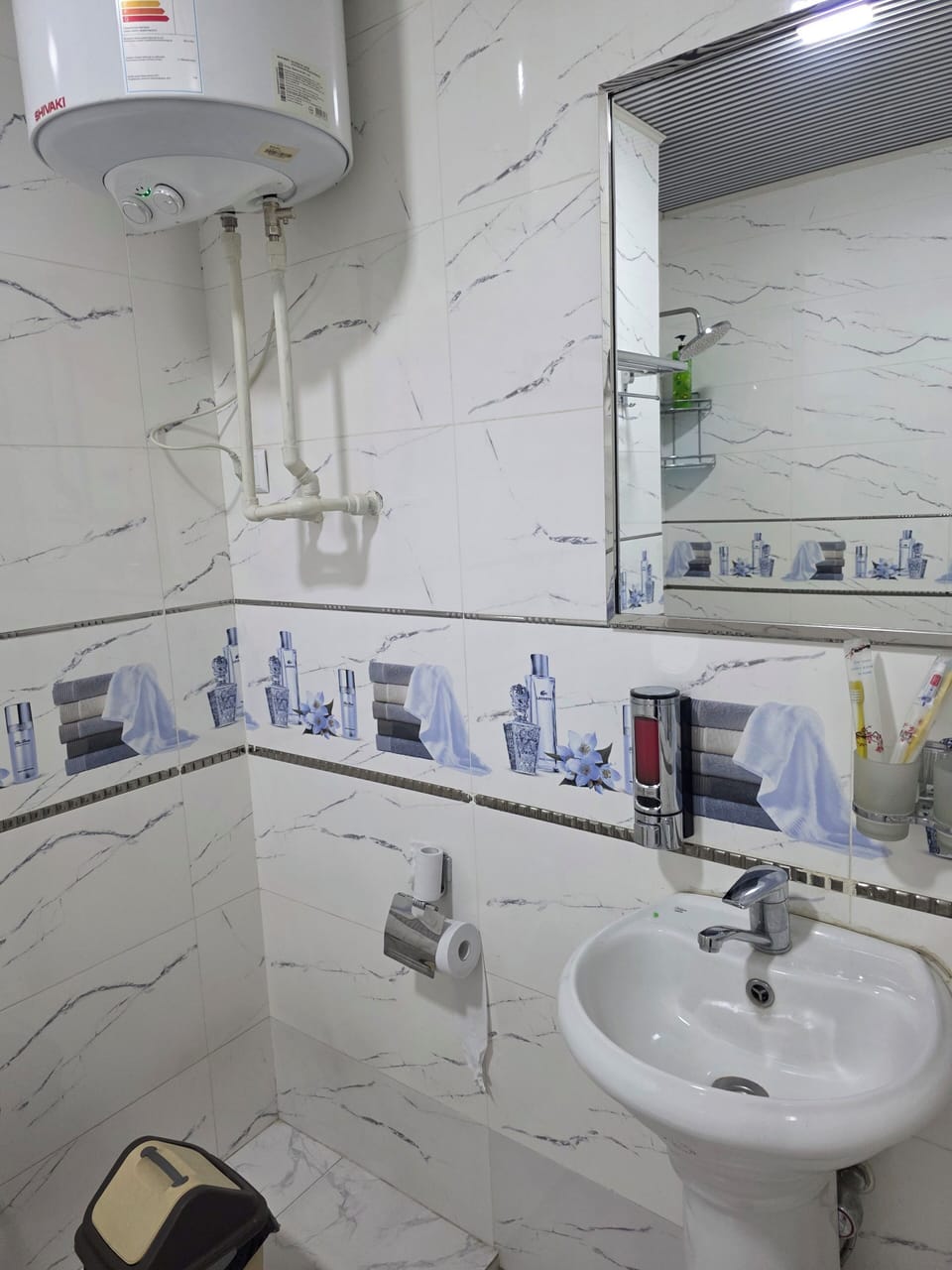 Shower, hair dryer, soap, shampoo