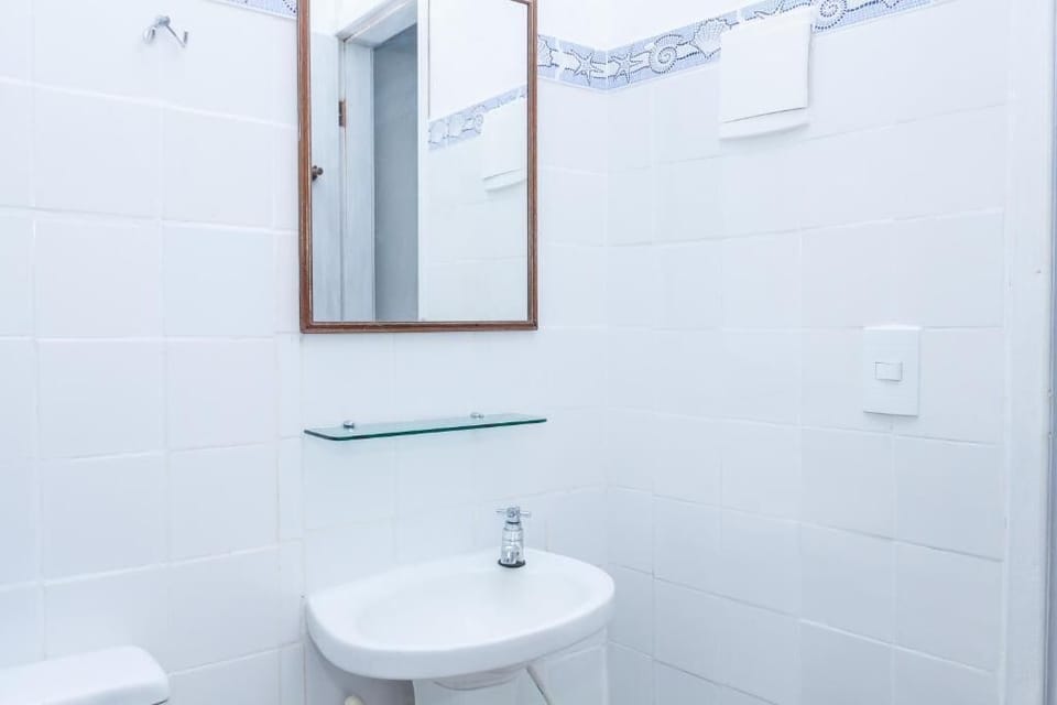 Triple Room, Garden View | Bathroom | Shower, towels, soap, toilet paper