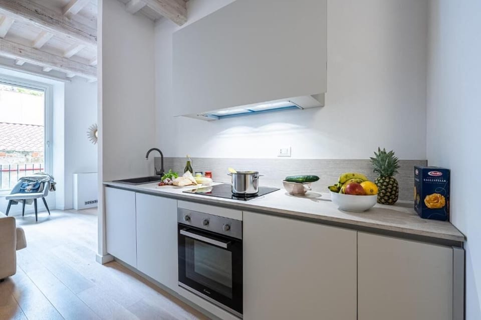 Family Condo | Private kitchen | Mini-fridge, microwave, stovetop, electric kettle