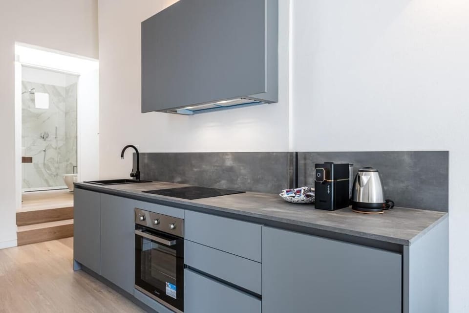 Exclusive Condo, Balcony | Private kitchen | Mini-fridge, microwave, stovetop, electric kettle