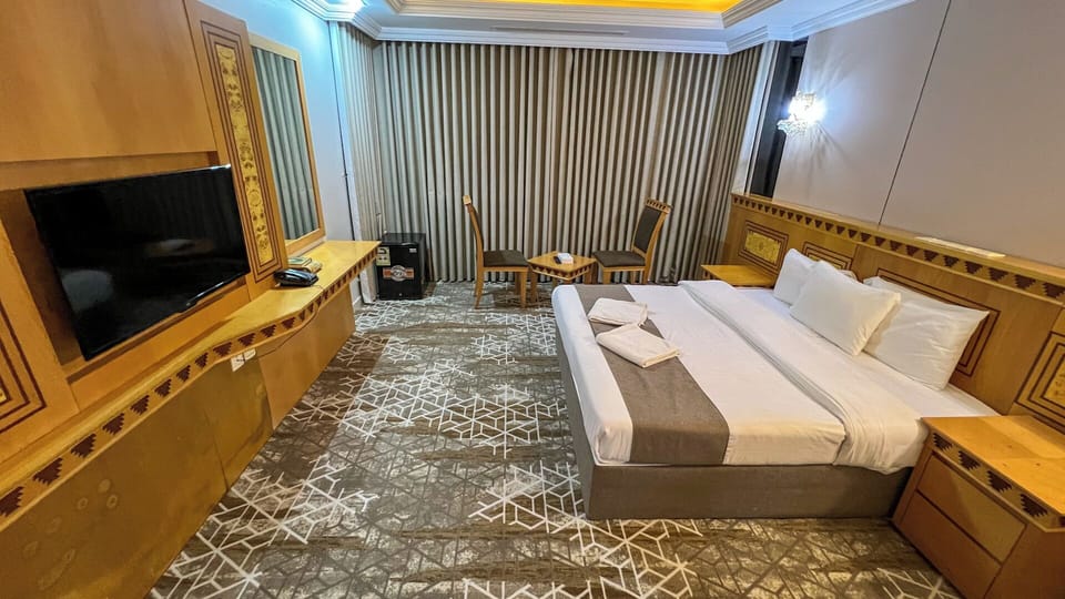 Deluxe Double Room, City View | In-room safe, blackout drapes, iron/ironing board, free WiFi