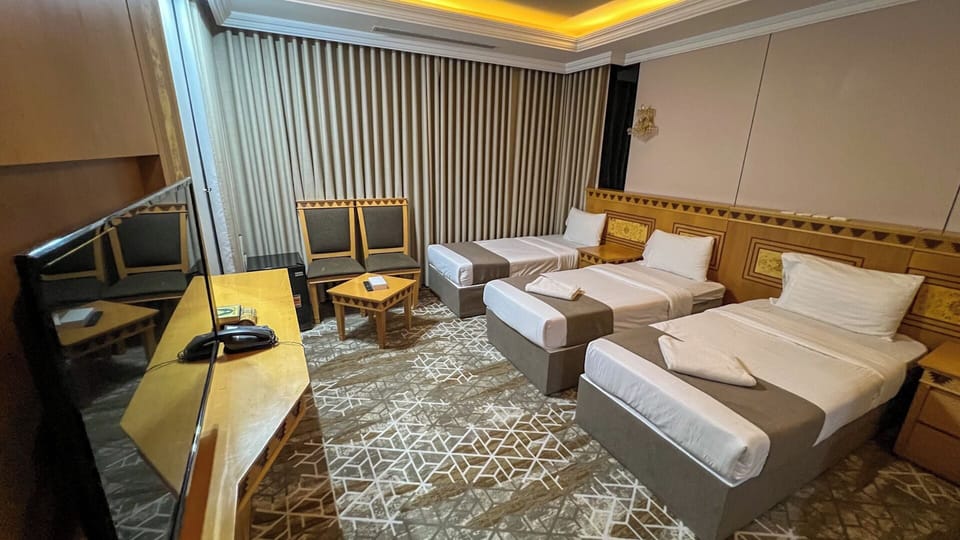 Deluxe Triple Room | In-room safe, blackout drapes, iron/ironing board, free WiFi