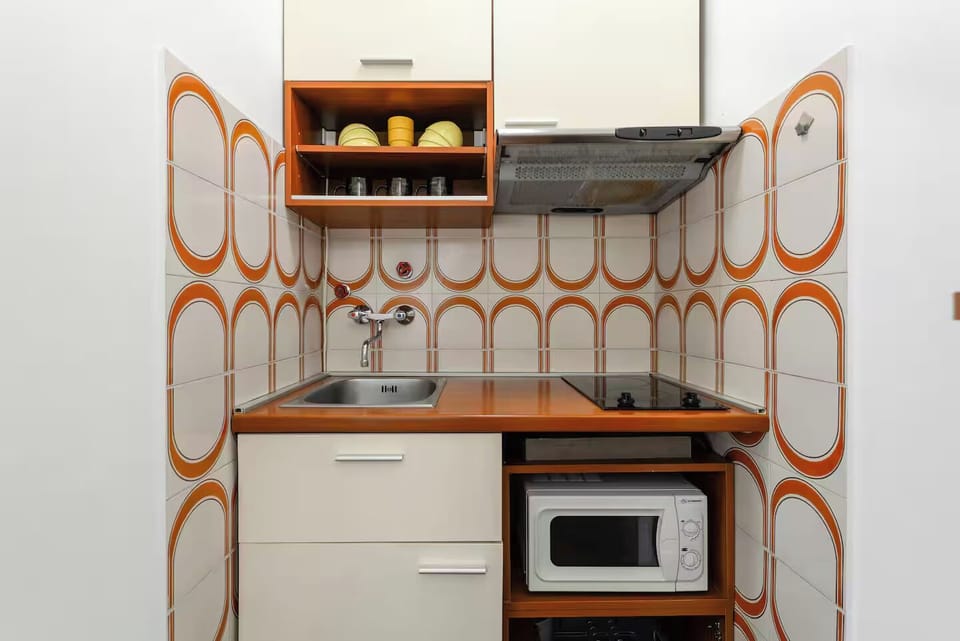 Design Apartment, 1 Bedroom, Private Bathroom, Garden View | Private kitchen | Highchair