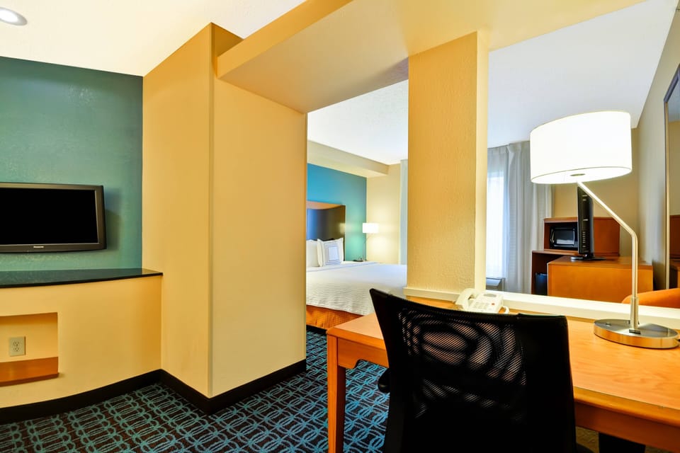 In-room safe, desk, iron/ironing board, cribs (free)