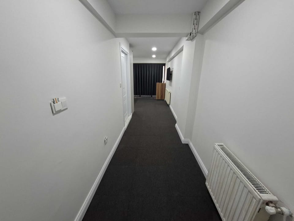 Deluxe Double Room, City View | Blackout drapes, soundproofing, iron/ironing board, free WiFi