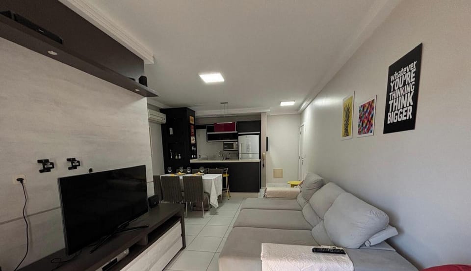 Deluxe Apartment | Living area | 40-inch TV with digital channels
