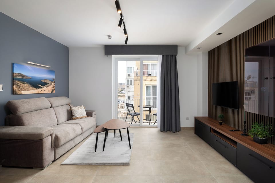 Penthouse, City View | Living area | Flat-screen TV