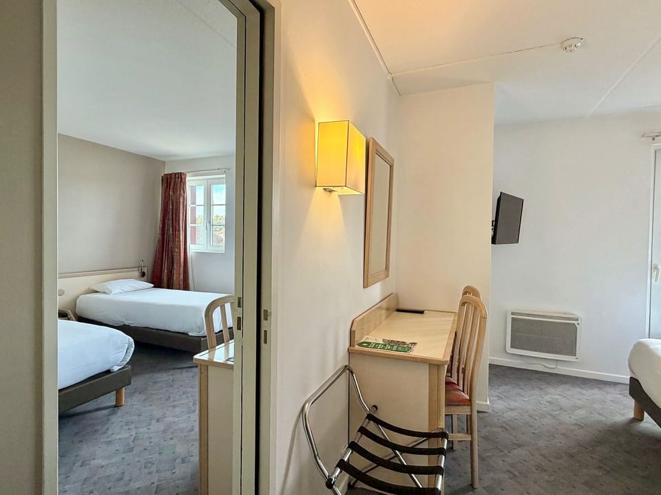 Desk, blackout drapes, iron/ironing board, free WiFi
