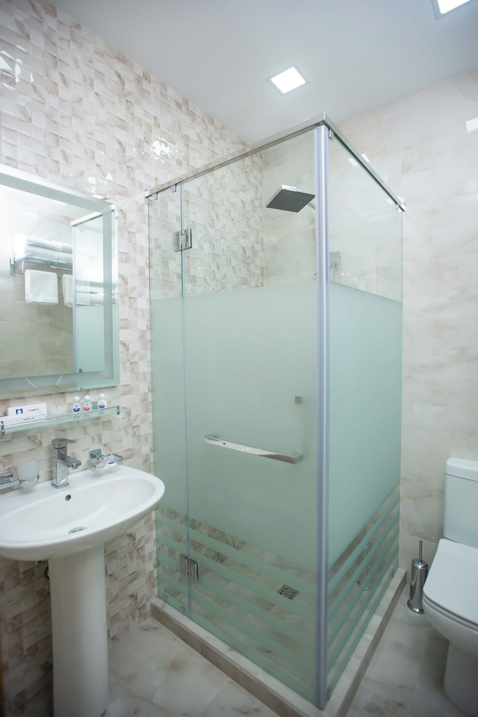 Shower, hair dryer, slippers, towels