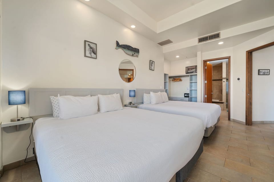 In-room safe, laptop workspace, blackout drapes, soundproofing