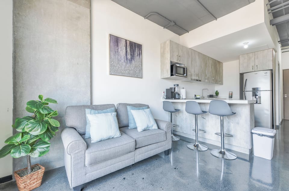 Comfort Suite, Balcony, City View | Living area | 55-inch Smart TV with digital channels, streaming services