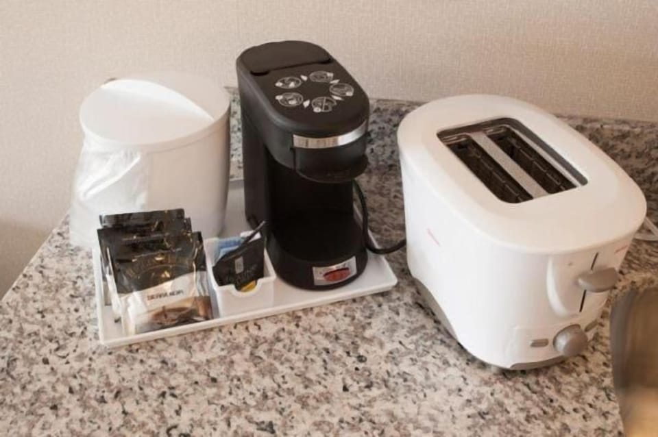 Coffee/tea maker, microwave, cookware/dishes/utensils