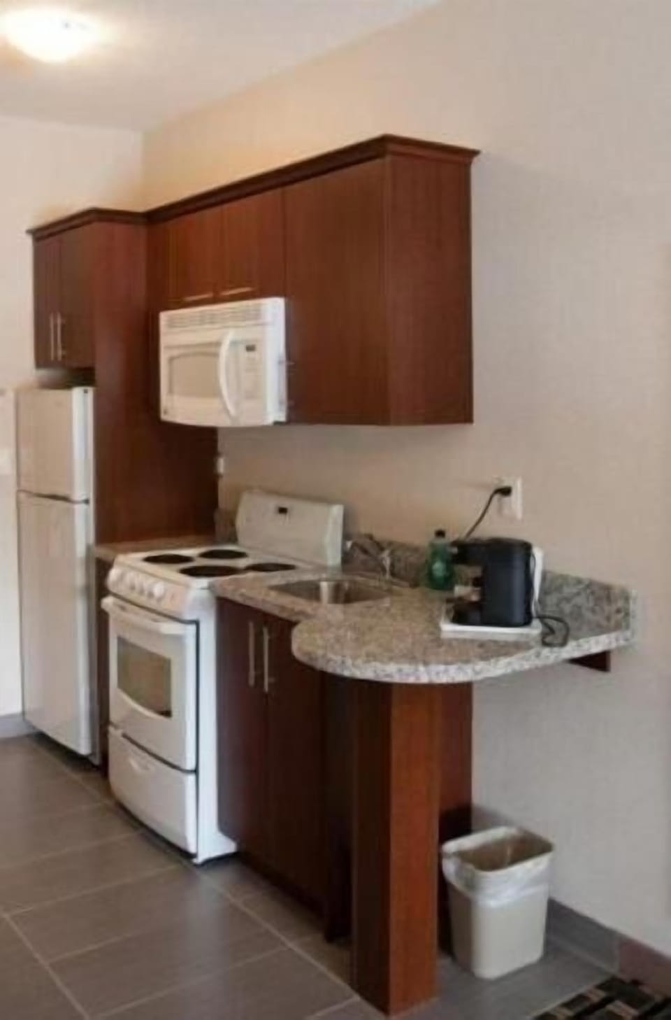 Coffee/tea maker, microwave, cookware/dishes/utensils