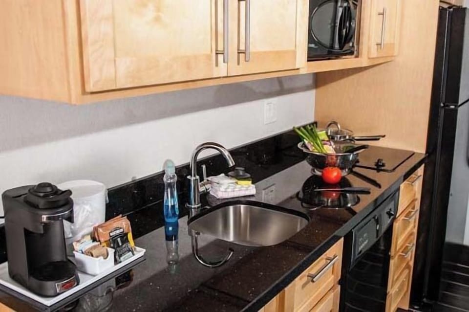 Coffee/tea maker, microwave, cookware/dishes/utensils