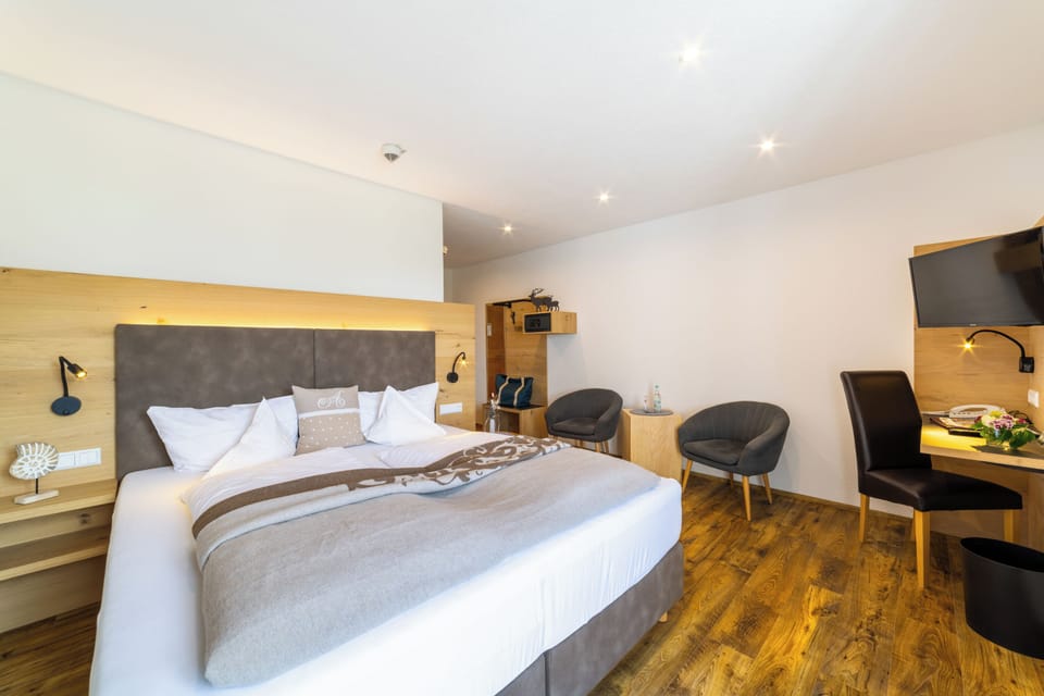 Comfort Suite, Balcony, Garden View | In-room safe, blackout drapes, soundproofing, free WiFi