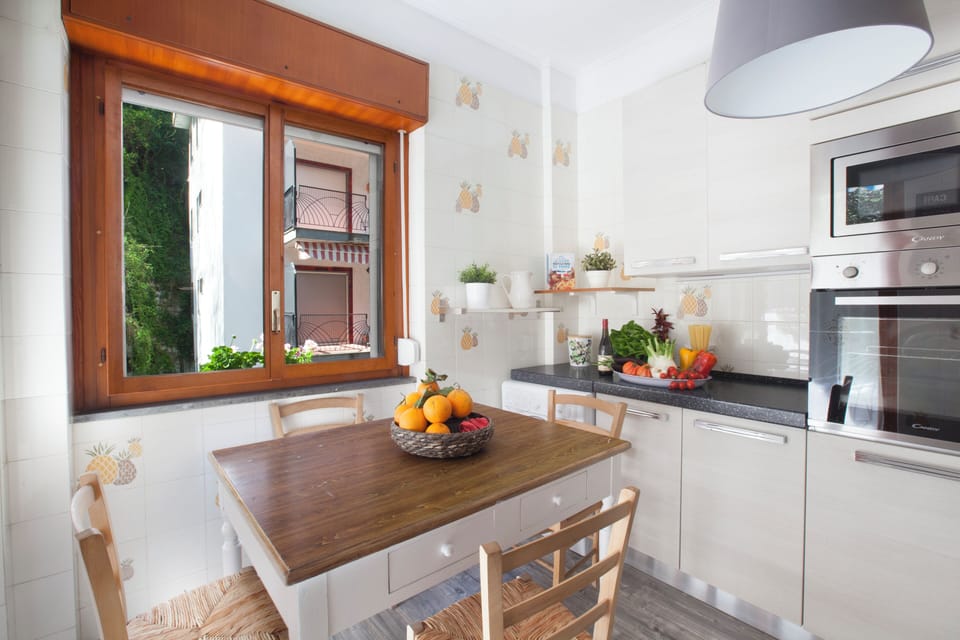 Apartment, Balcony, Partial Sea View | Private kitchen | Full-size fridge, microwave, oven, stovetop