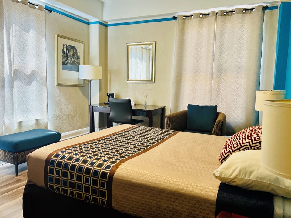 Standard Room, 1 Queen Bed, Private Bathroom | Desk, blackout drapes, free WiFi, bed sheets