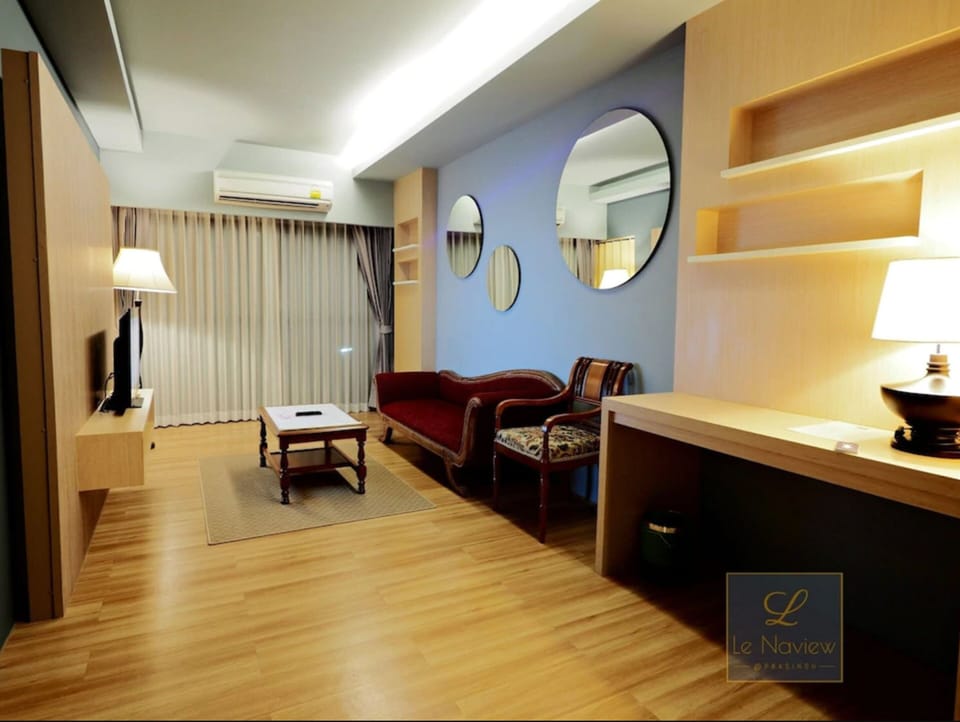 Mini Suite | Living room | 55-inch Smart TV with cable channels