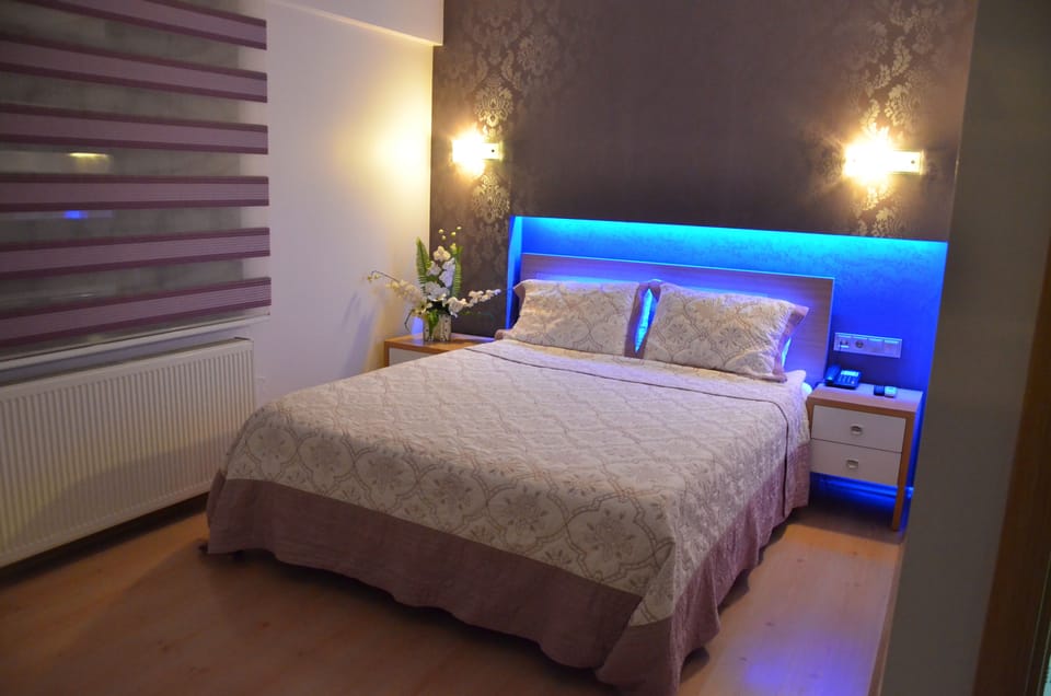 Double Room | Free minibar items, in-room safe, desk, rollaway beds