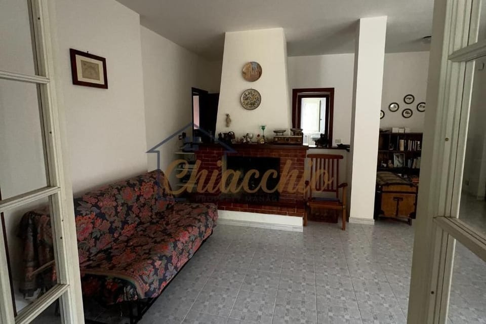 Villa, Patio, Partial Sea View | Living area | Flat-screen TV, fireplace