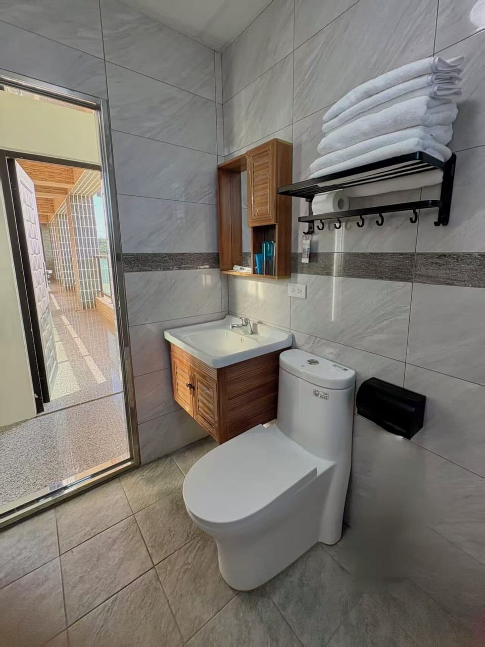 Basic Quadruple Room, Courtyard View | Bathroom | Shower, free toiletries, hair dryer, slippers