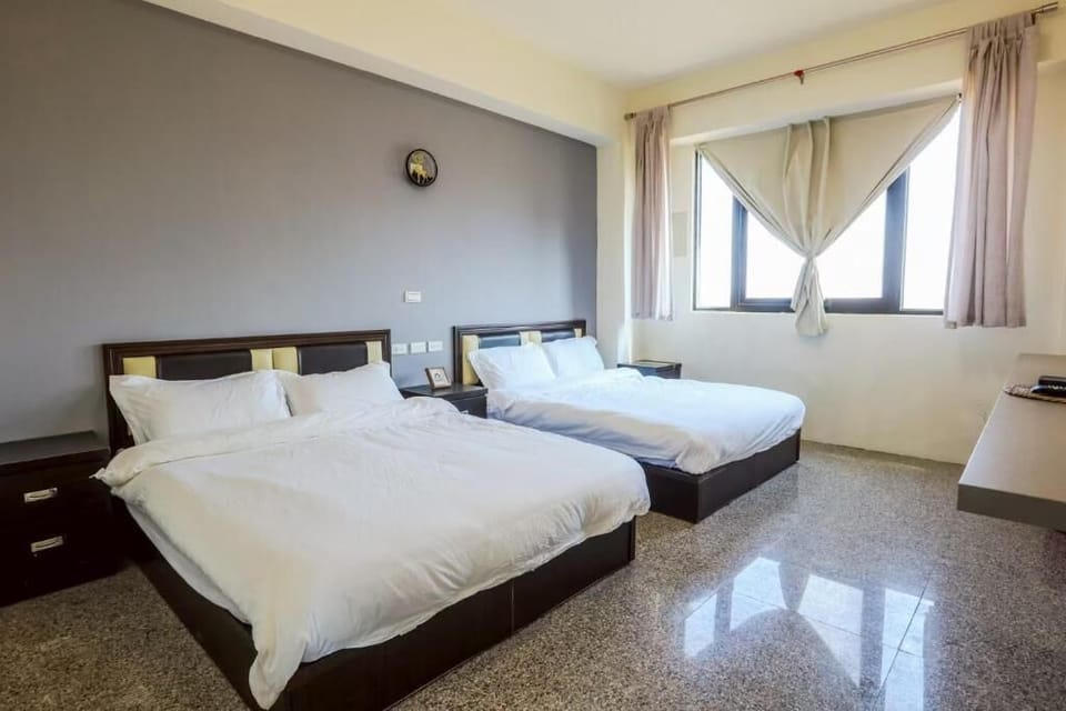 Basic Quadruple Room, Courtyard View | Laptop workspace, free WiFi