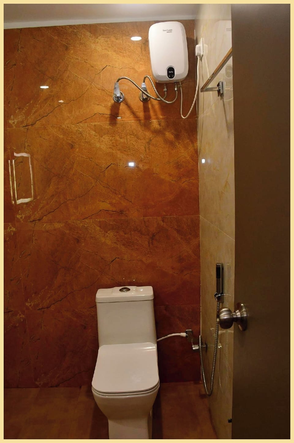 Shower, rainfall showerhead, slippers, towels