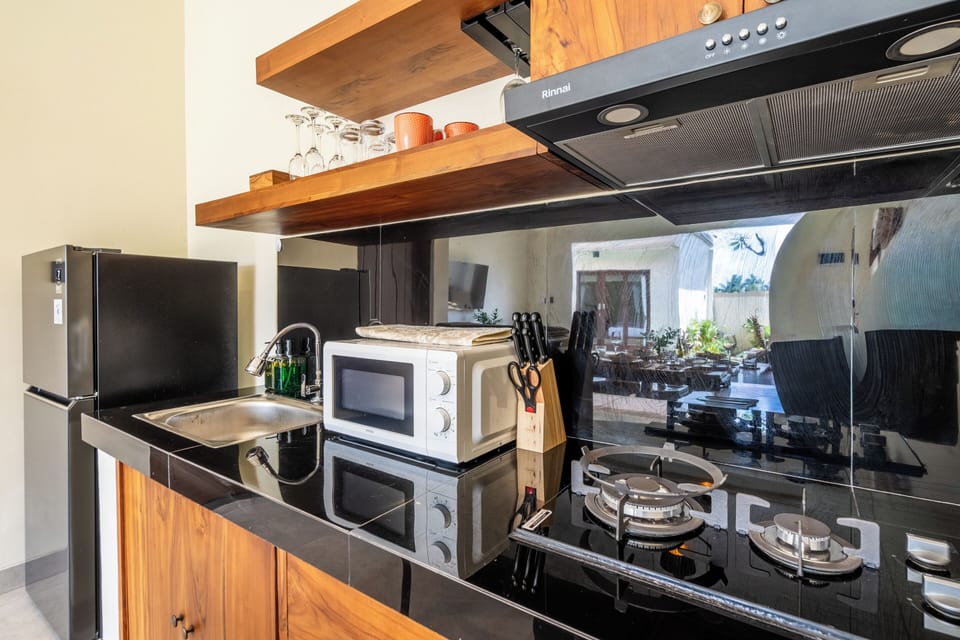 Deluxe Villa, Pool View | Private kitchen | Full-size fridge, microwave, stovetop, cookware/dishes/utensils