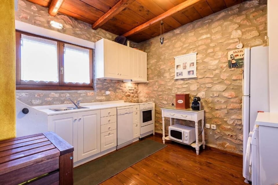 House, Partial Sea View | Private kitchen | Espresso maker, electric kettle, highchair
