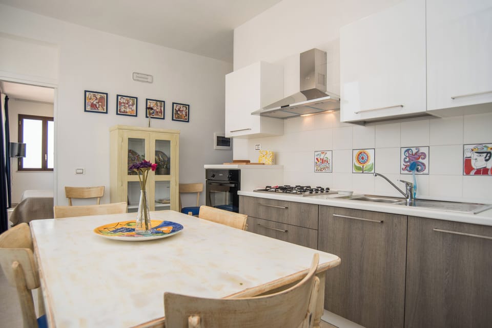 Panoramic Apartment, Sea View | Private kitchen | Cookware/dishes/utensils