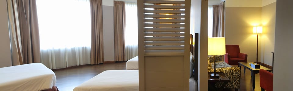 Family Suite | In-room safe, desk, blackout drapes, iron/ironing board (on request)