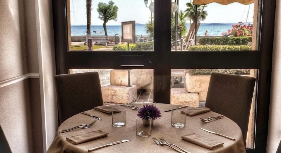 Breakfast, lunch, dinner served; Italian cuisine, alfresco dining 