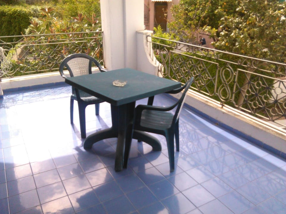 Standard Quadruple Room, 1 Bedroom, Private Bathroom, Mountain View | Premium bedding, desk, laptop workspace, blackout drapes