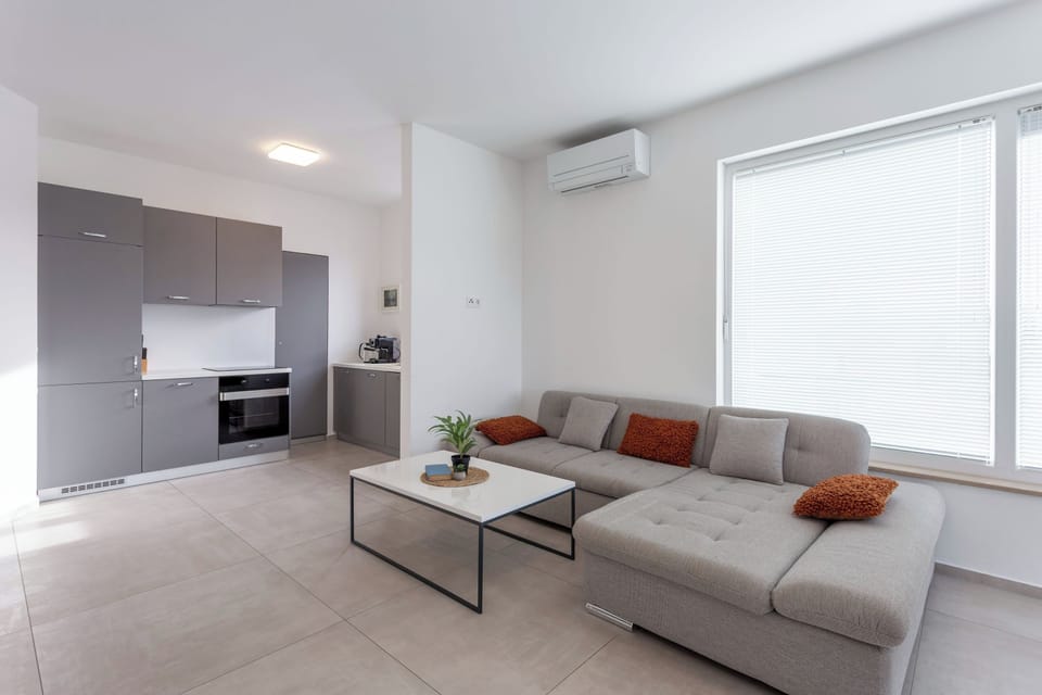 Standard Apartment, 2 Bedrooms, Balcony (Apartment Sang Near The Beach) | Living area | Smart TV