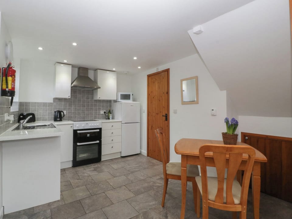 Fridge, microwave, toaster, cookware/dishes/utensils