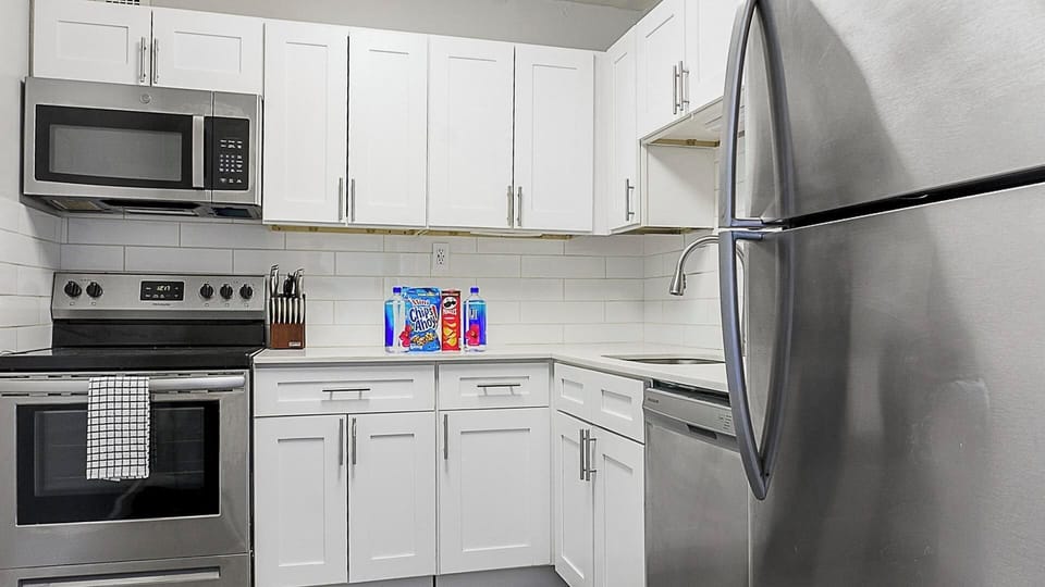Apartment (1 Bedroom) | Private kitchen | Fridge