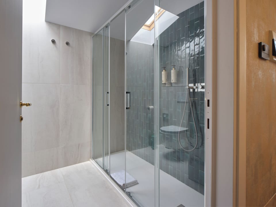 Romantic Suite, City View | Bathroom | Shower, hair dryer, slippers, soap