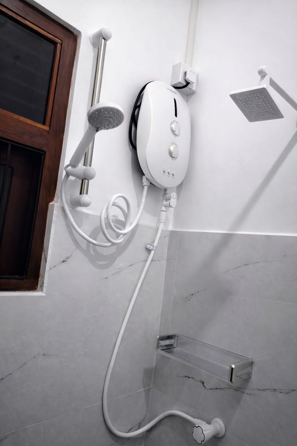 Shower, towels, soap, toilet paper
