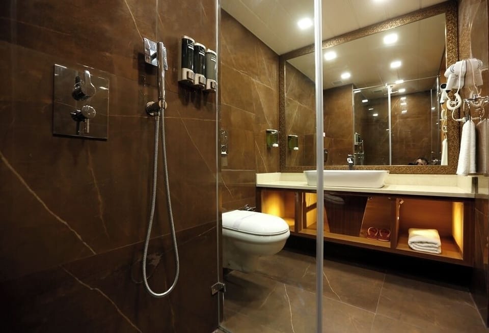 Shower, slippers, towels, soap