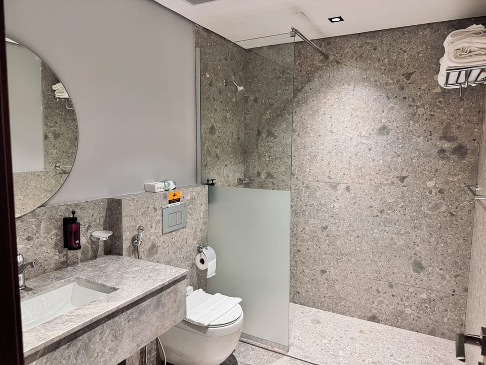 Quadruple Room, City View | Bathroom | Separate tub and shower, hair dryer, bidet, towels