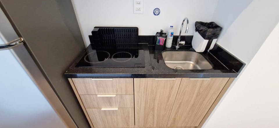 Basic Apartment | Private kitchen | Fridge, microwave, stovetop, blender
