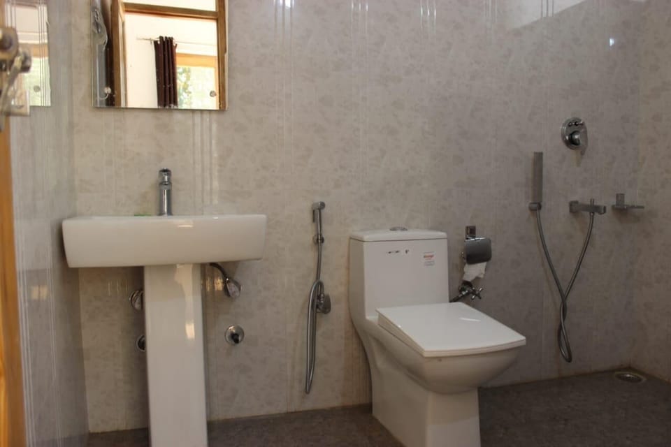 Deluxe Double Room, Hill View | Bathroom | Shower, slippers, towels, soap